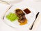 Gourmet Tender Juicy Grilled Meat on White Plate