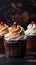 Gourmet treats Cupcakes on dark background, providing ample space for text