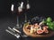 Gourmet wine and cheese appetizer set with camembert and figs