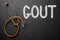 Gout - Text on Chalkboard. 3D Illustration.