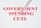 Government spending cuts.