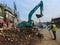 Government workers cleaning the streets during the corona in Bangladesh. Large amount of dirt being cleaned beside the streets