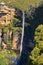 Govetts Leap Falls descending into the Grose Valley located with