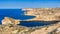 Gozo, Malta - The famous Azure Window with the Fungus rock and Dwejra bay