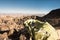 GPS navigator and backpack mountain top in desert