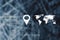 Gps pin among luggage and world map, globetrotting caption