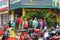 Grab and Now drivers queue to order food on Pham Ngoc Thach street. Online transportation service