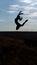 Graceful acrobatic woman leaping