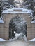 graceful arabian horse posing in old gates