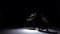 Graceful contemporary dance of two dancers on black, shadow, slow motion