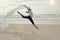 Graceful dancer on beach