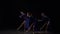 Graceful hard-working ballerinas dancing in blue dress at studio. Slow motion