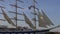 Graceful Italian sailing ship entering port at the end of its trip, slow motion