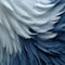 Graceful Movements: A Close-up Of Blue And White Feathers