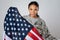 Graceful patriotic lady posing with a flag