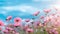 Graceful Pink Blooms: Field of Delicate Pink Flowers Amidst a Softly Blurred Backdrop - Captivating Nature\\\'s Beauty