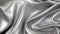 Graceful Silver Satin: A Hyper-detailed Uhd Image Of Slumped-draped Lycra Texture
