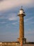 The Grade 2 listed historic sandstone tower of the East Pier Lighthouse in Whitby, North Yorkshire, England, UK