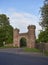 The Grade II listed red sandstone arched side entrance into the Letham Grange Estate and Golf Course.