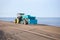 Grader or bulldozer sand Working at Maltakva beach, Georgia