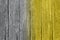 Gradient Ultimate Gray and Illuminating yellow wooden surface toned in trendy colors of 2021