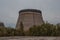 Grading cooling tower located in the Chernobyl ghost town