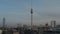 Gradually approaching footage to town dominant, 368 meters tall TV tower, Fernsehturm. Berlin, Germany.