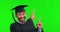 Graduate, man portrait and green screen with hands pointing for education and college deal. Male person, smile and