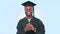 Graduate, student and celebrate for future, portrait and smile in mockup by advertising graduation. Happy black man