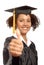 Graduate with thumbs up