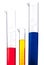 Graduated cylinders of different colored chemicals