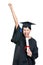 Graduating student gesturing fist with the diploma