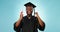 Graduation celebration, education and studio black man excited for university graduate success. Phd diploma, student