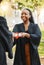 Graduation diploma, ceremony and happy black woman with learning success, education development or graduate scroll