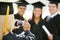 Graduation: Girl Takes Photo of Friends