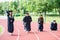 Graduation group of students celebrating on athletic track, prep