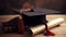 Graduation hat and certificate on wooden table