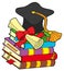 Graduation hat on pile of books