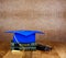 Graduation mortarboard on top of stack of books