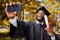 Graduation selfie, success and student or man on university or college campus, profile picture and diploma or