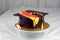 Graduation shaped fondant cake