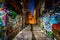 Graffiti Alley at night, in the Station North District, of Baltimore, Maryland.