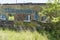 Graffiti covered derelict industrial buildings in remote location