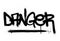 Graffiti danger word sprayed in black over white