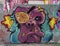 Graffiti dog face mural by artist Facke Uno in the Fabrication Yard in Dallas, Texas.