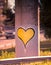 Graffiti with a heart on a concrete column