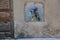 Graffiti painting on wall: modern scene of Jan Vermeer `Girl with pearl earring`