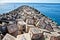 Graffiti on a stones of a breakwater in Santa Cruz de Tenerife,