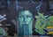 Graffiti style mural, a surrealistic self-portrait by contemporary artist Hatziel Flores on Fabrication Street in Dallas, Texas.