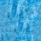 Grain blue paint wall background or texture